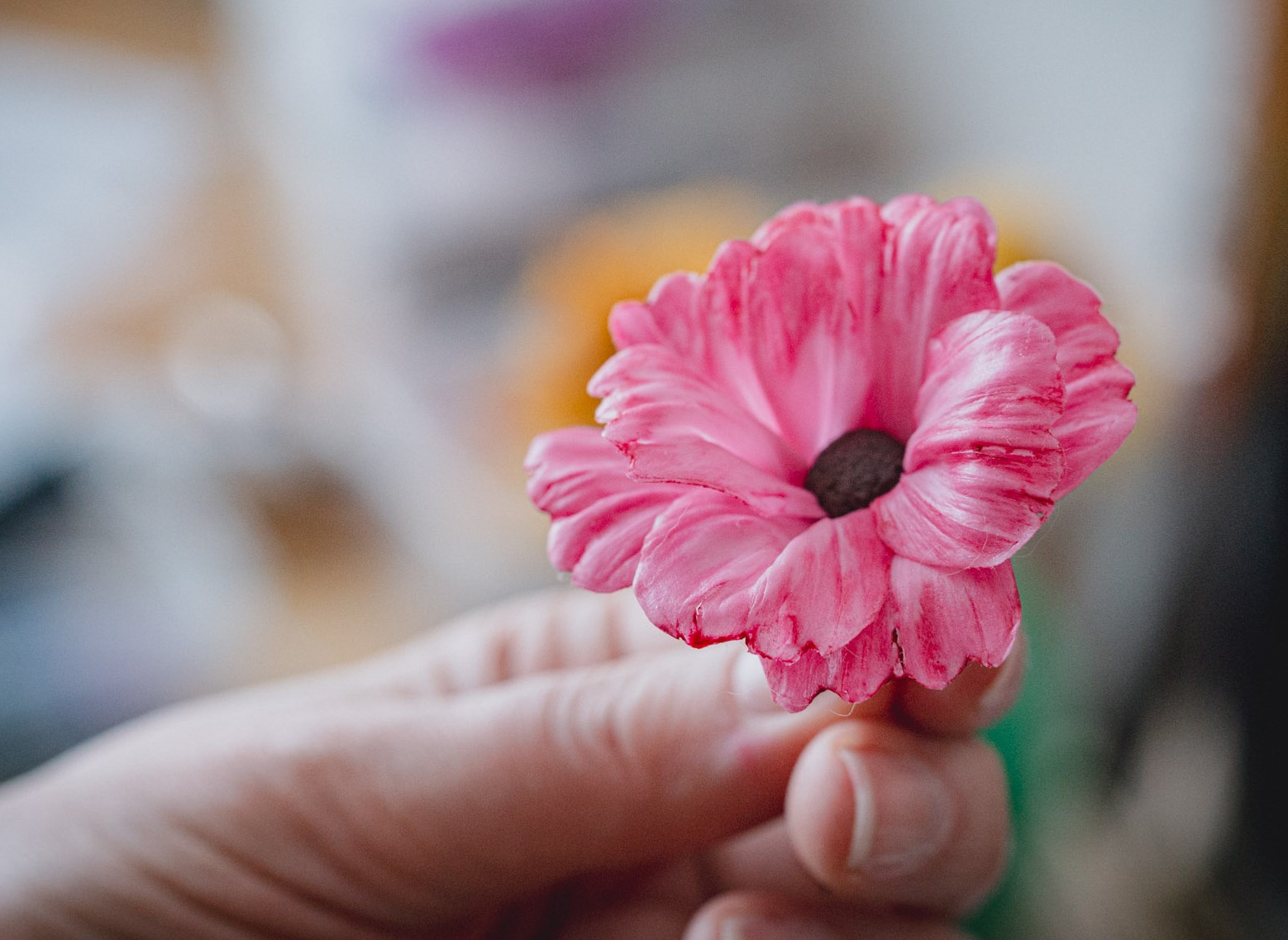 Finished pink polymer clay flower